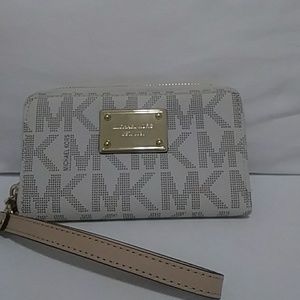 Michael Kors cream/white wallet wristlet.